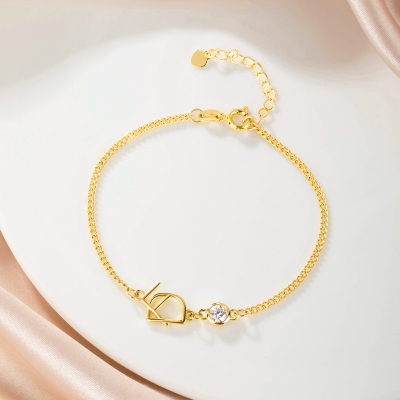Interlocking Letters Curb Chain Bracelet