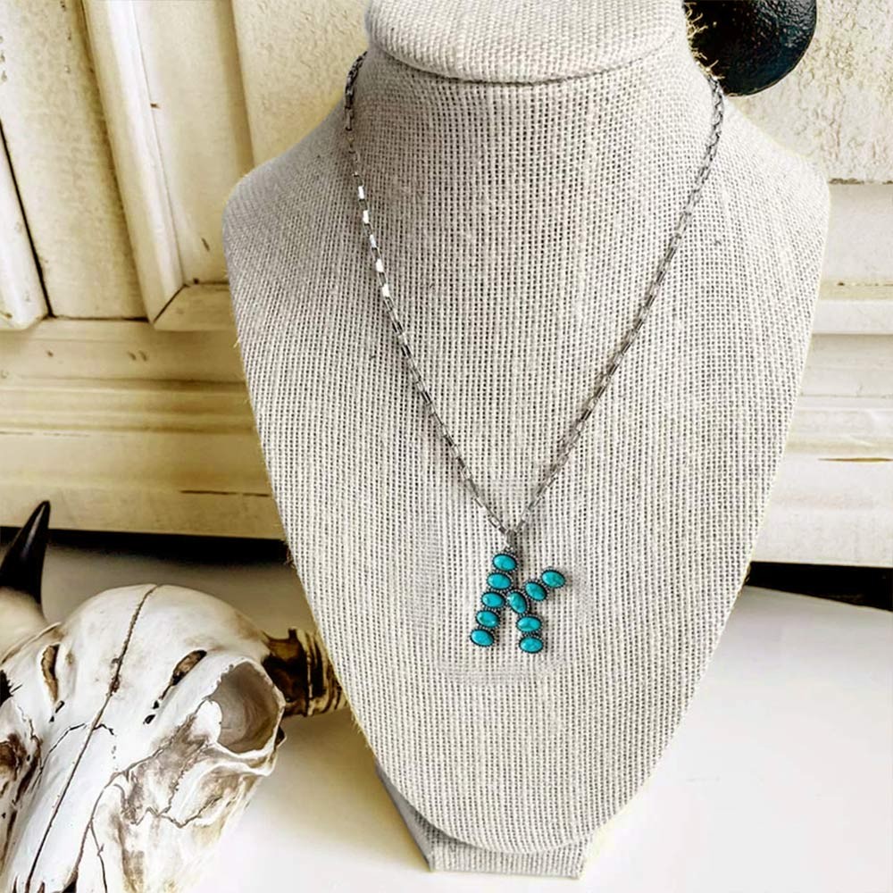 initial turquoise