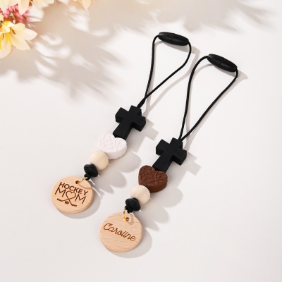 carved wooden pendant